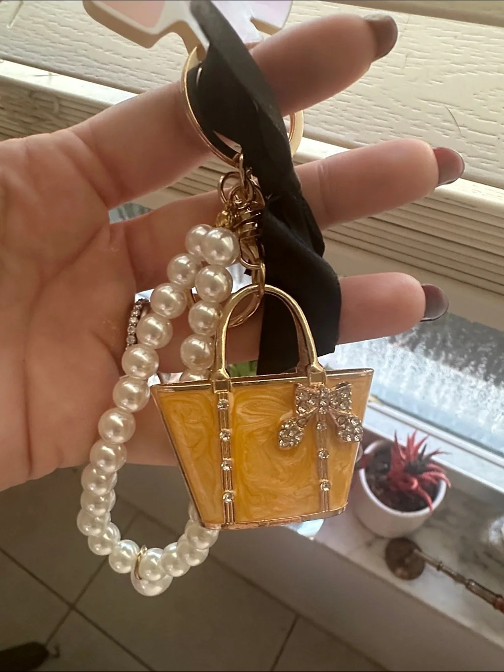 Yellow Handbag Keychain with Pearl-Accent and Black Bow